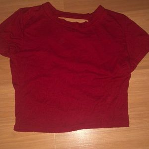 red cropt op with crisscrosss detail jn back